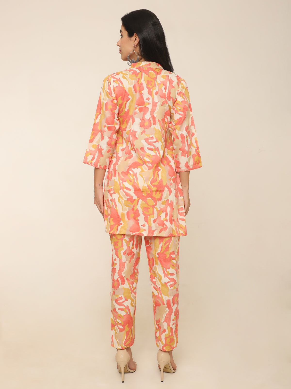 Vibrant orange cotton co-ord set with mirror work and beads detail.