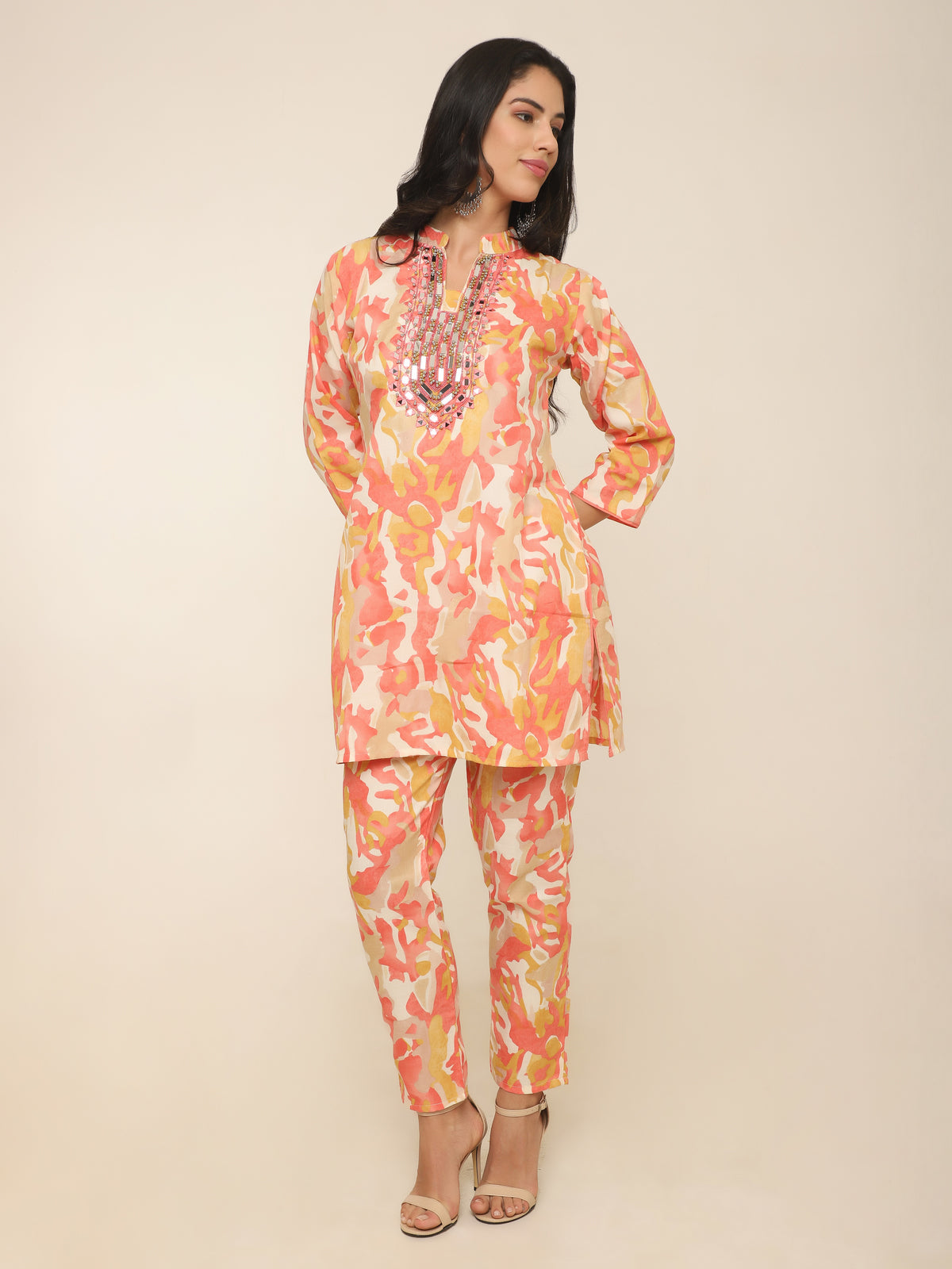 Vibrant orange cotton co-ord set with mirror work and beads detail.