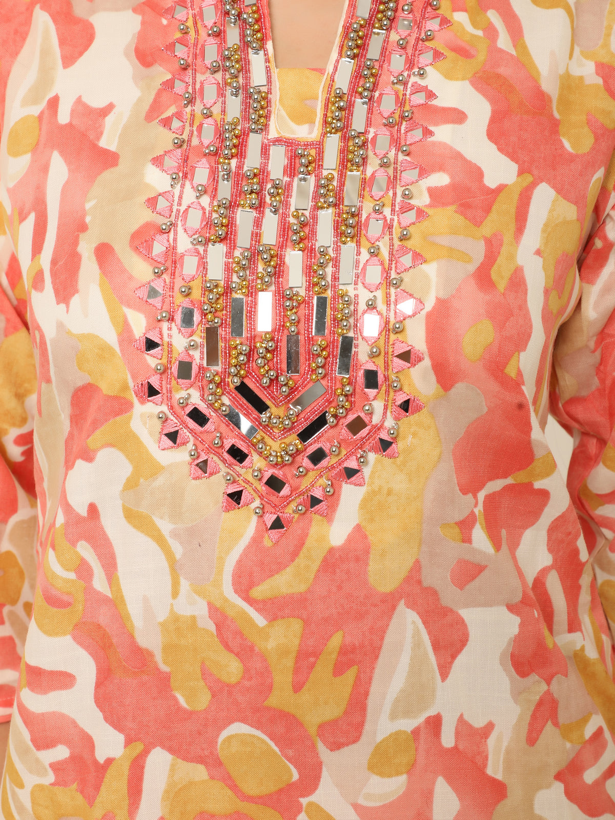 Vibrant orange cotton co-ord set with mirror work and beads detail.