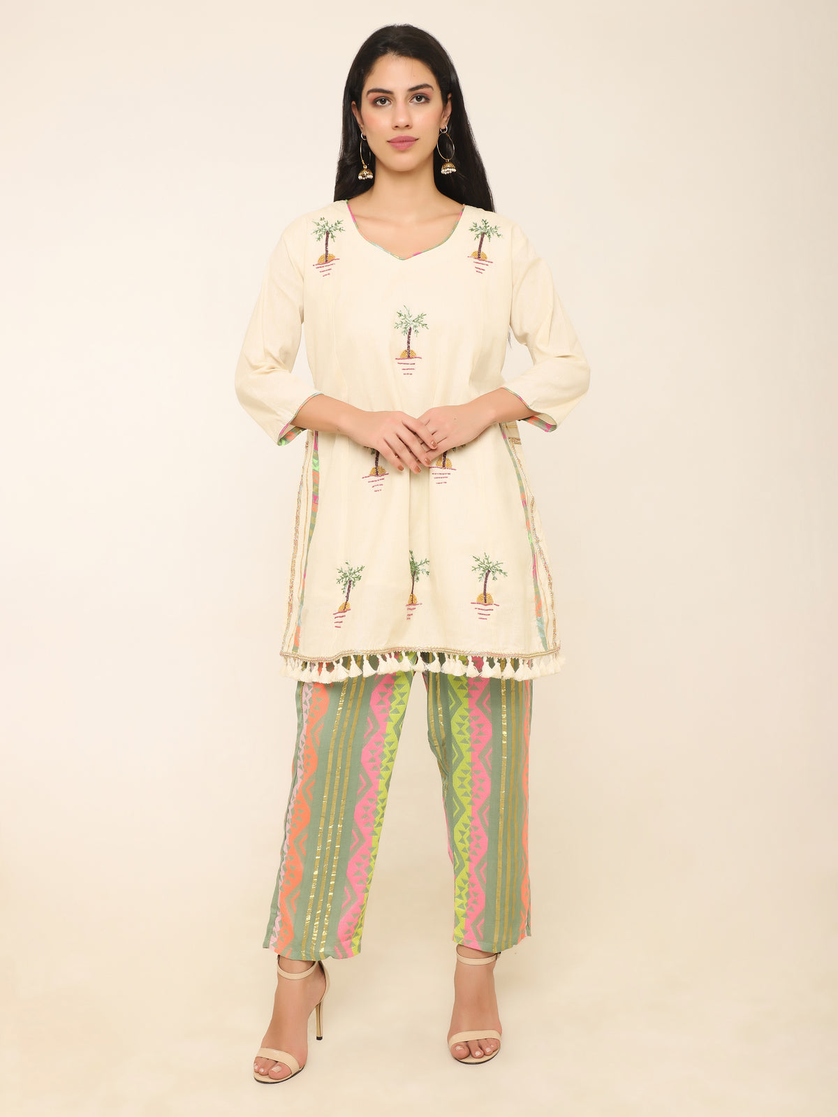 Ivory Co-ord set with beadwork & multi color pants.