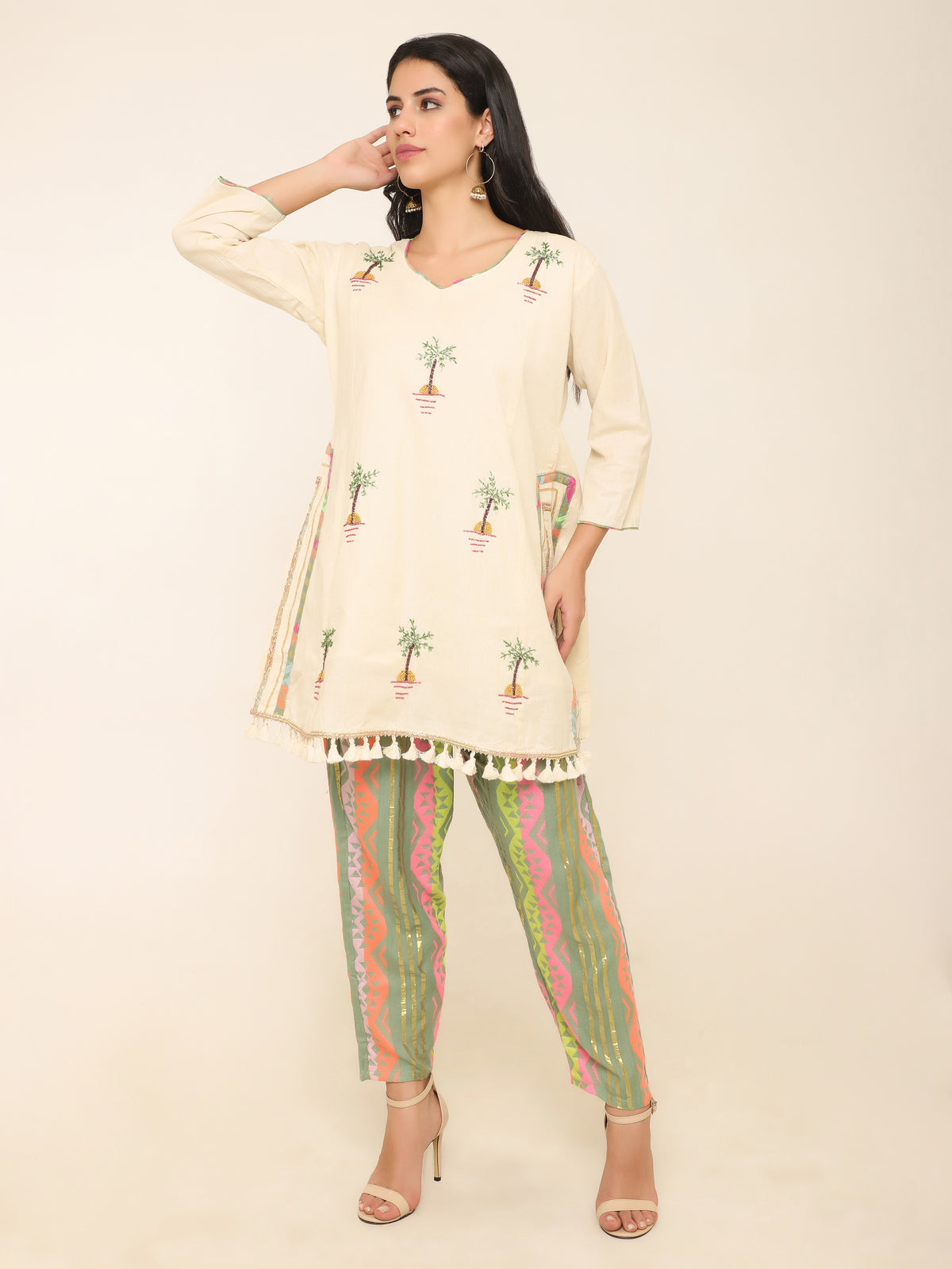 Ivory Co-ord set with beadwork & multi color pants.