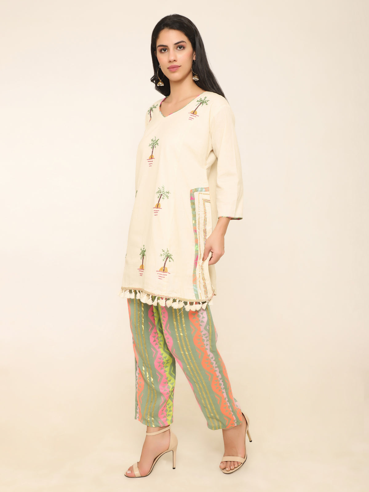 Ivory Co-ord set with beadwork & multi color pants.