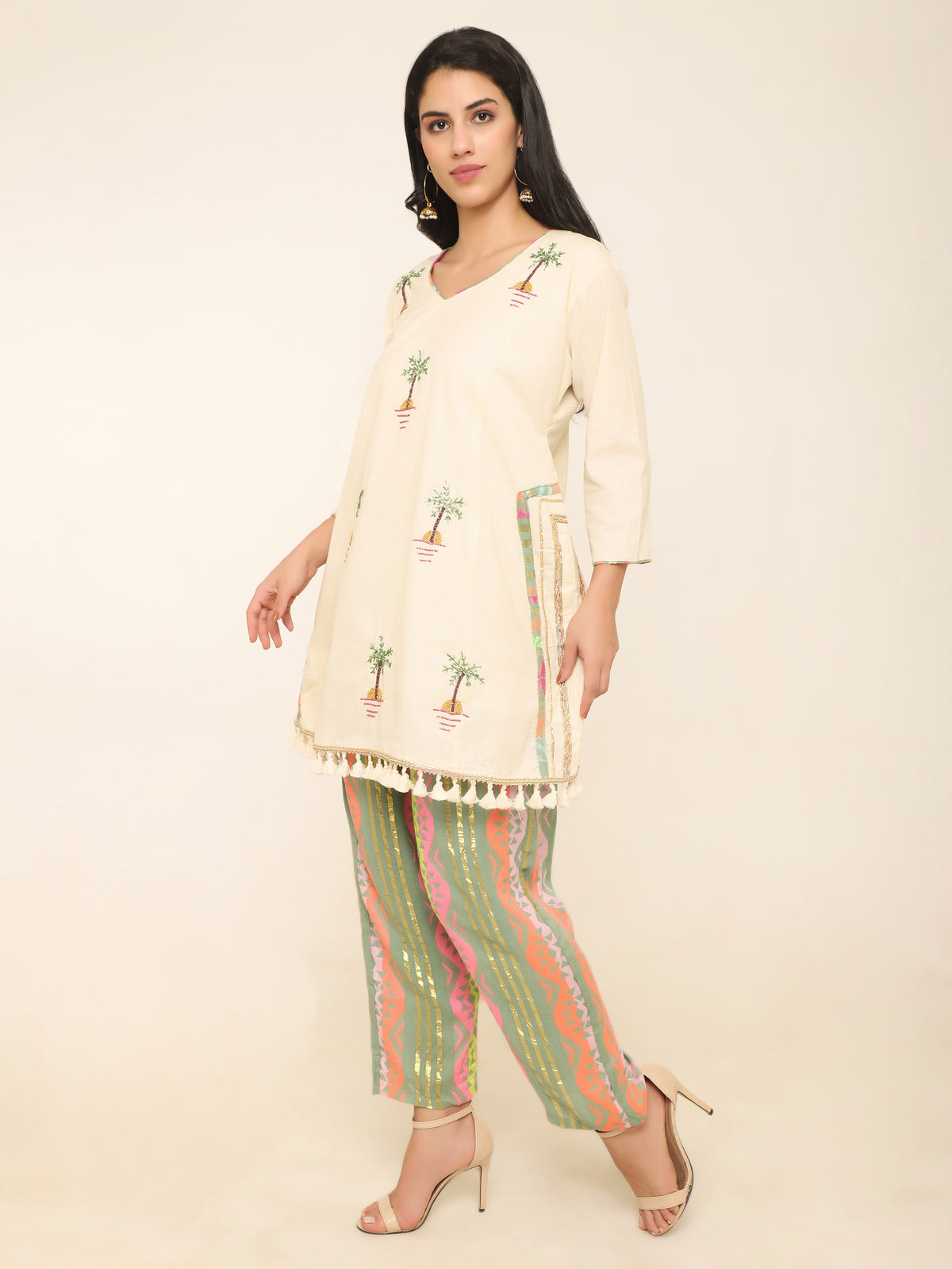 Ivory Co-ord set with beadwork & multi color pants.