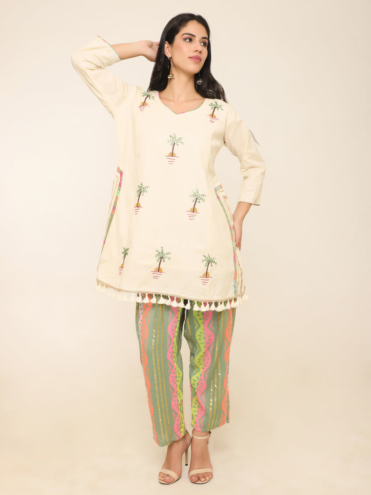Ivory Co-ord set with beadwork & multi color pants.