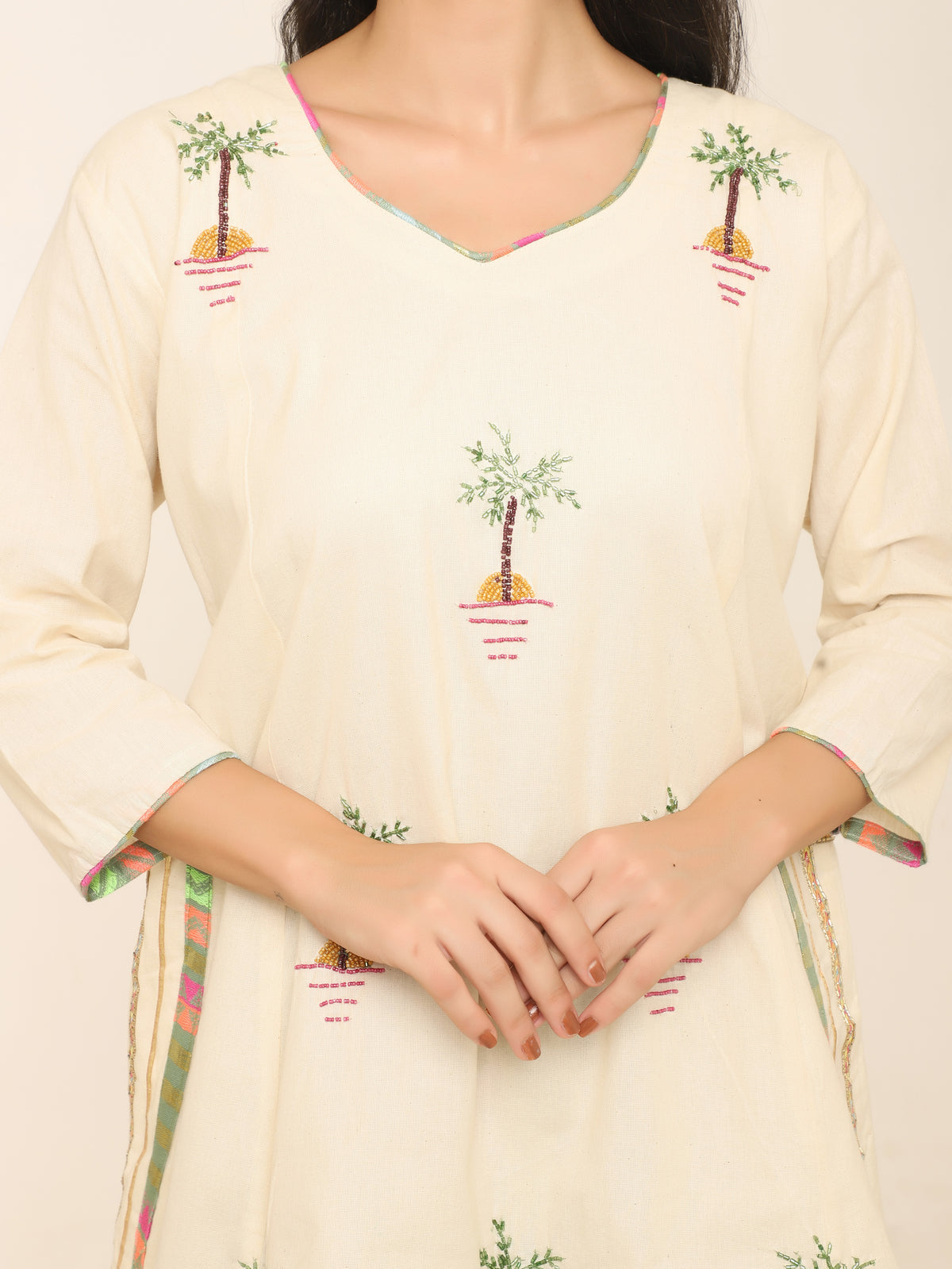 Ivory Co-ord set with beadwork & multi color pants.